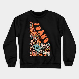 Idaho State Design | Artist Designed Illustration Featuring Idaho State Outline Filled With Retro Flowers with Retro Hand-Lettering Crewneck Sweatshirt